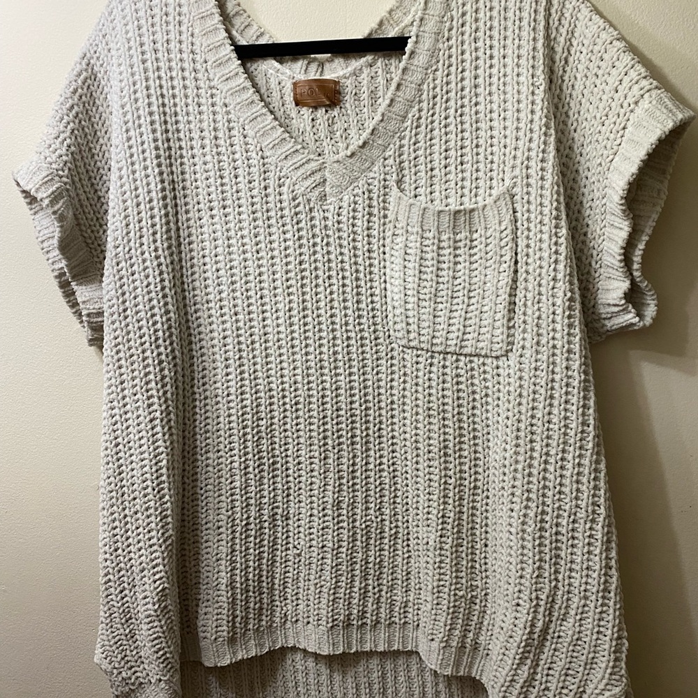 POL- cream, short sleeved knit sweater. Size medium